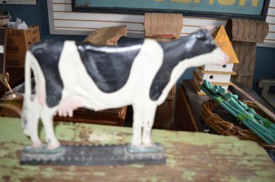 Teneur de porte vache. 1