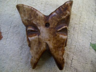 Nice double face bone carving 1
