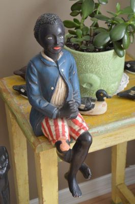 Negro butler carving 1