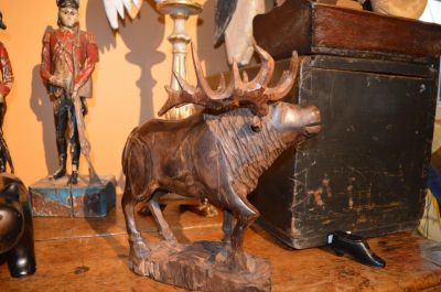 Folk-art moose carving 1