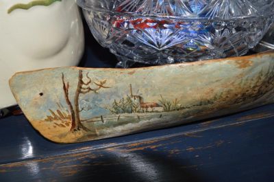 Carved painted canoe 6