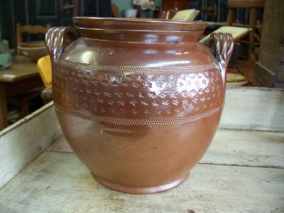 Nice old pottery jat with brown glaze and stars motives around 2