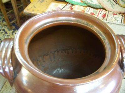 Nice old pottery jat with brown glaze and stars motives around 4