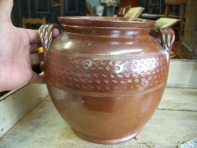 Nice old pottery jat with brown glaze and stars motives around 6