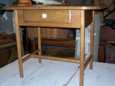 Small stretcher table w drawer  10