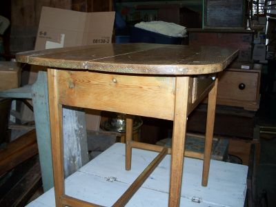 Small stretcher table w drawer  7