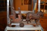 carved horse team and buggy