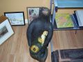Nice tall carved folk bear with bottle